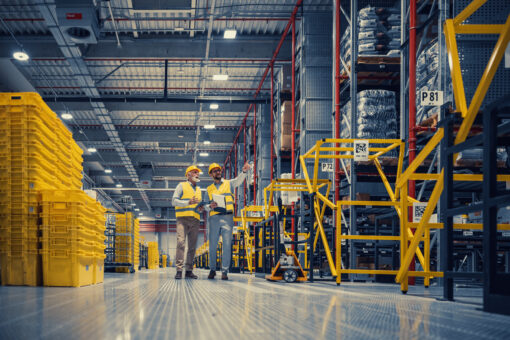 Two associates in a logistics center